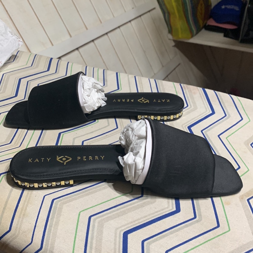 Very stylish black satin slide, pearls!  Can be dressed up or with shorts.